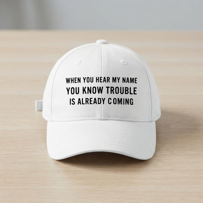 When You Hear My Name Trouble Is Coming Graphic Baseball Cap - Sarcastic Quote Cap (White)