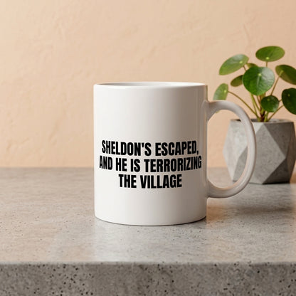 Sheldon's Escaped And He Is Terrorizing The Village Funny Ceramic Coffee Mug - Hilarious Sarcastic Quote Drinkware Cup (11oz)